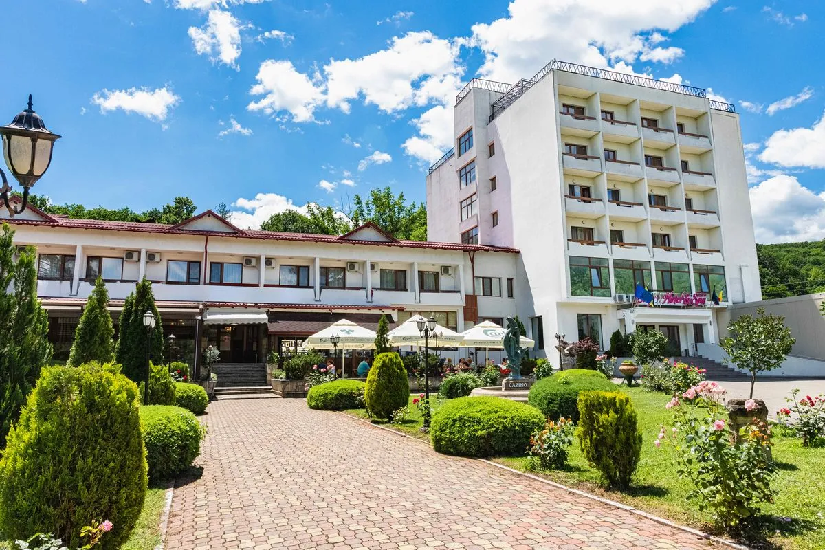 Harbor arrival and waterfront hotel setting